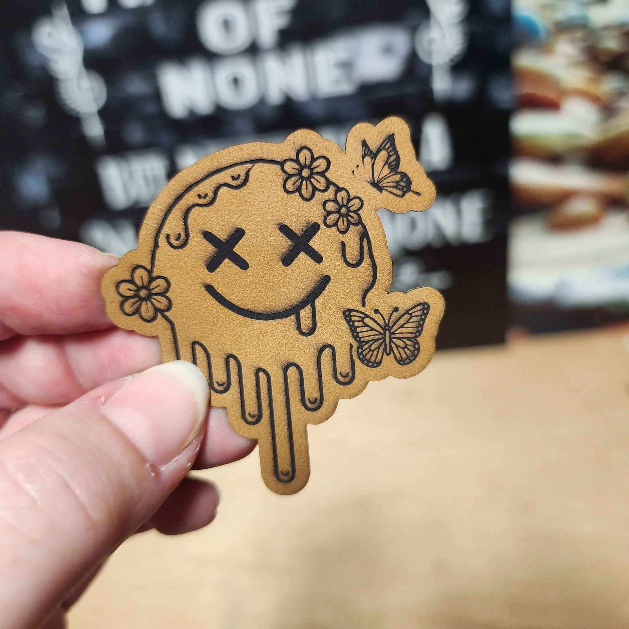 Melting Smiley with Butterflies (Saddle Tan) Engraved Leatherette Hat Patch - MR01