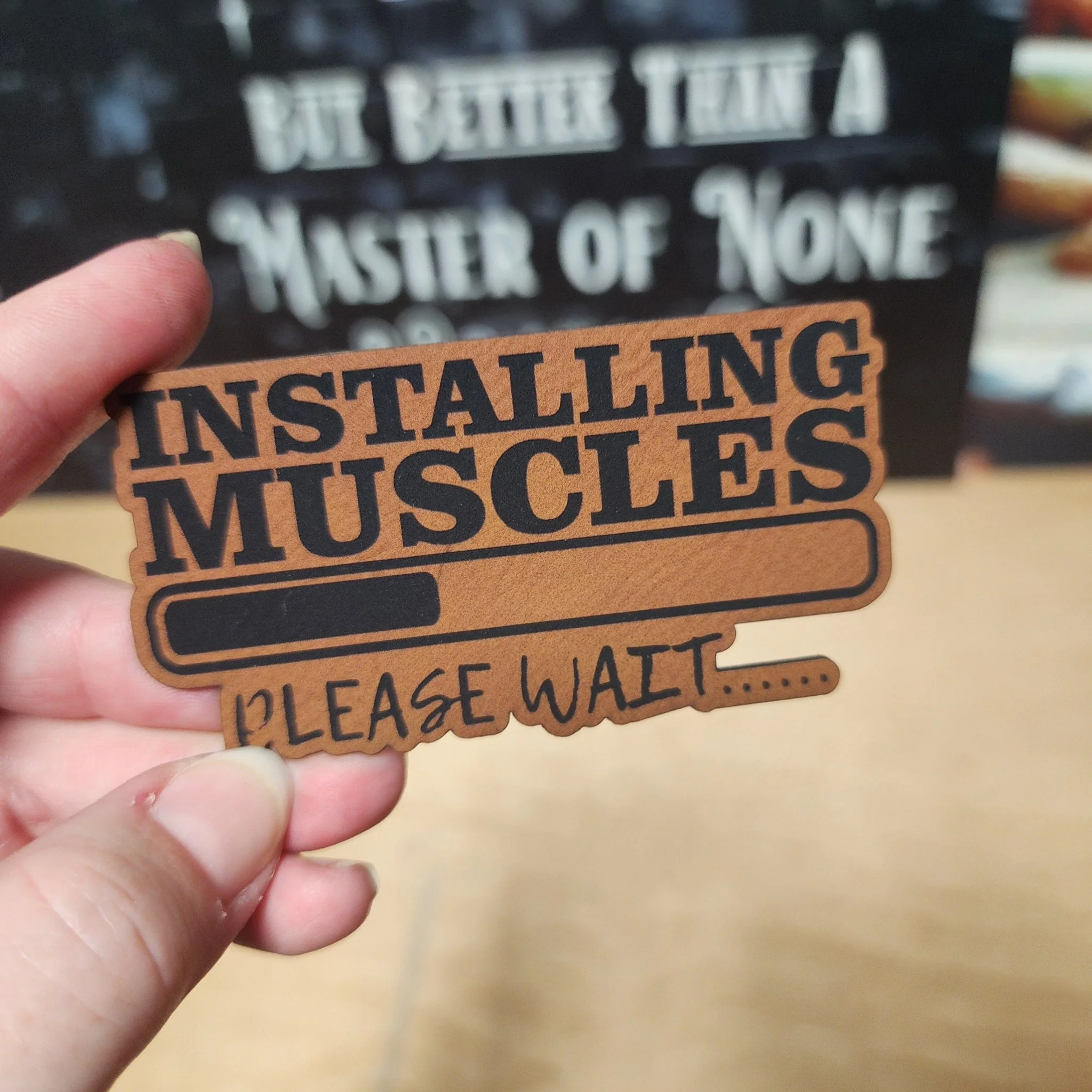 Muscle Installation In Progress (Rawhide) Engraved Leatherette Hat Patch - MR01