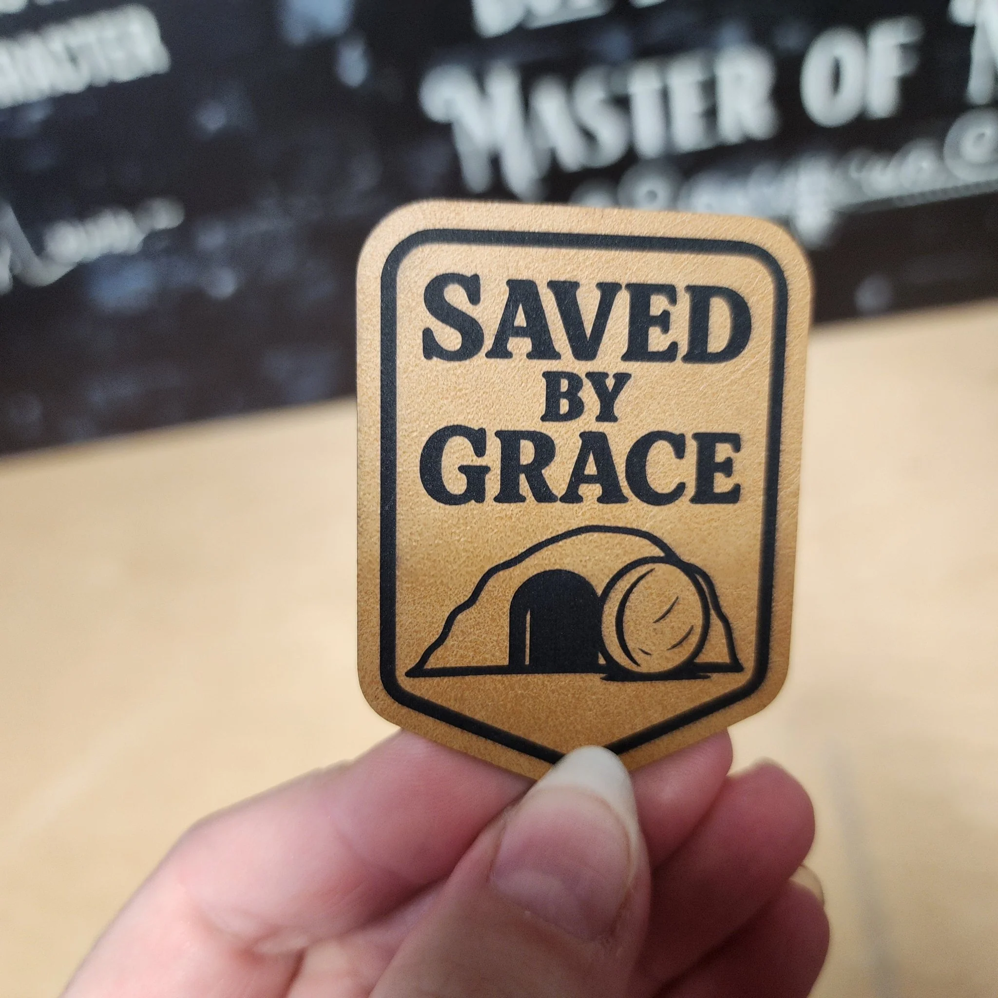 Saved By Grace Tomb (Saddle Tan) Engraved Leatherette Hat Patch - MR01