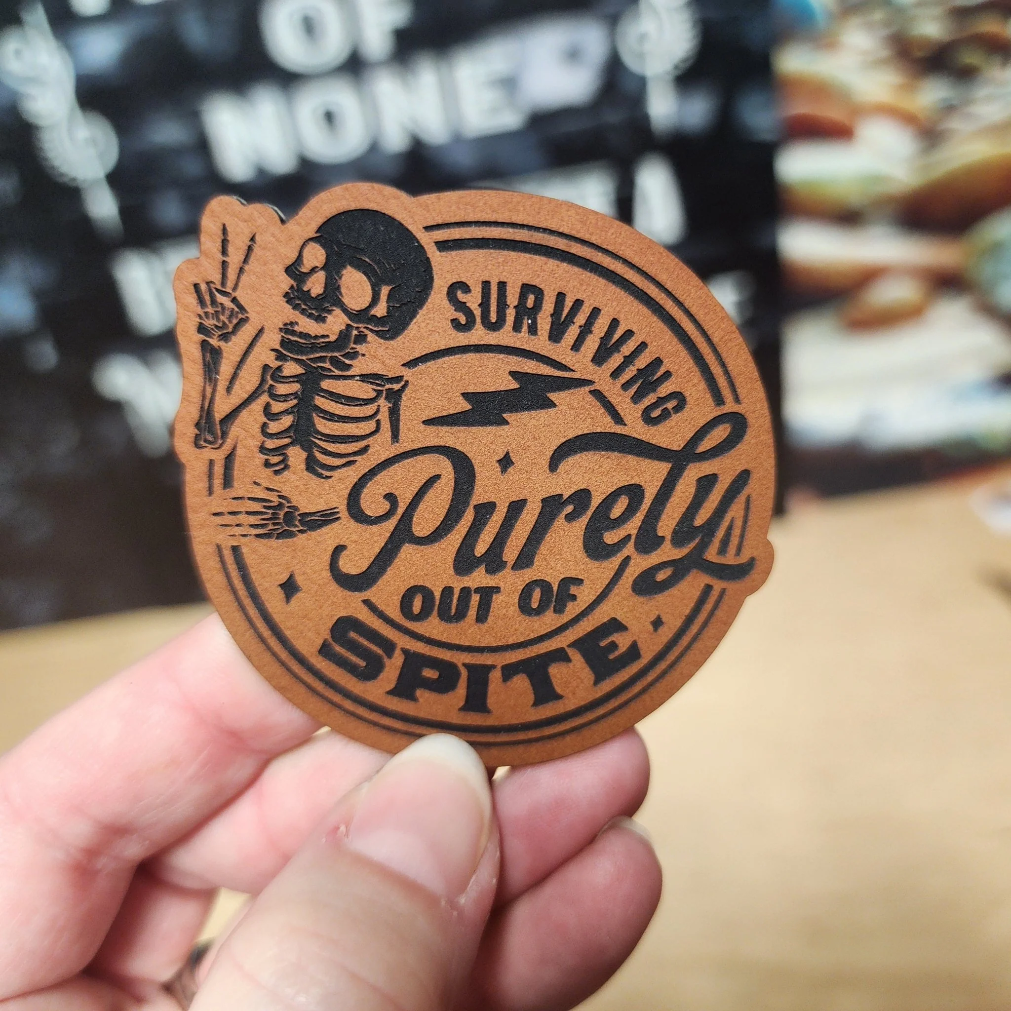 Surviving Purely Out of Spite (Rawhide) Engraved Leatherette Hat Patch - MR01